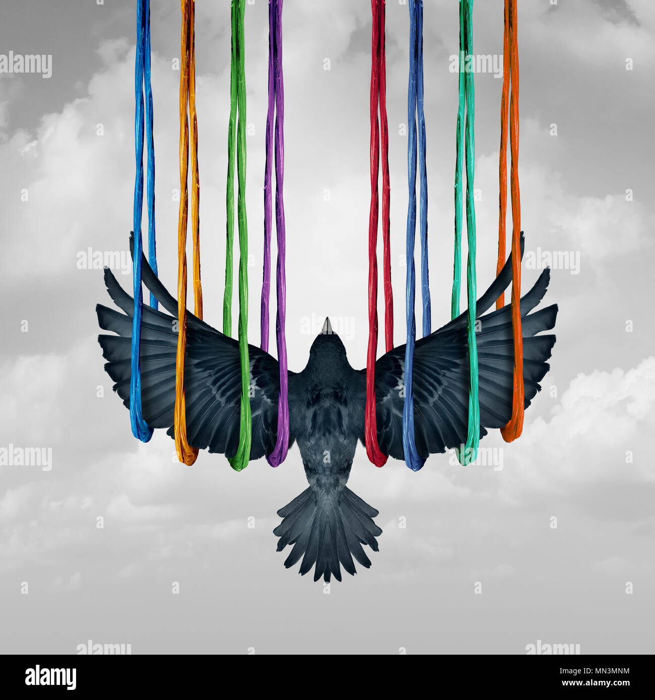 Concepto e ideas y de apoyo al sistema metáfora es una idea surrealista con un pájaro levantado por un grupo diverso de cuerdas en un estilo de ilustración 3D. Foto de stock