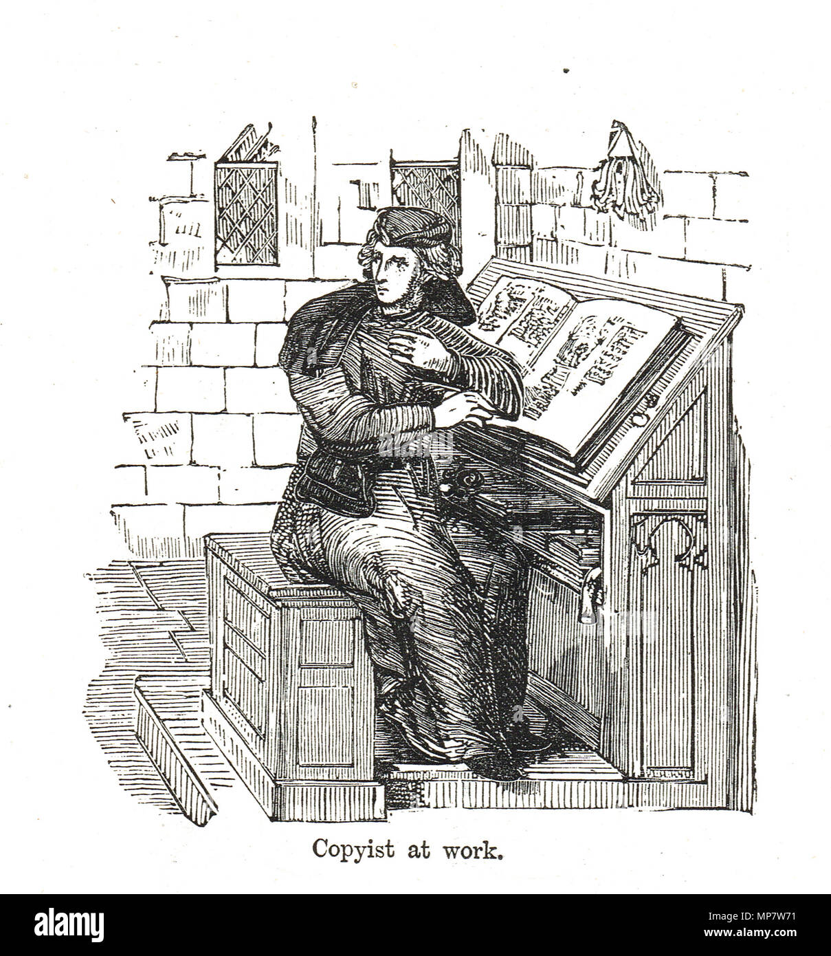 Un copista en el trabajo en el siglo 15 Foto de stock