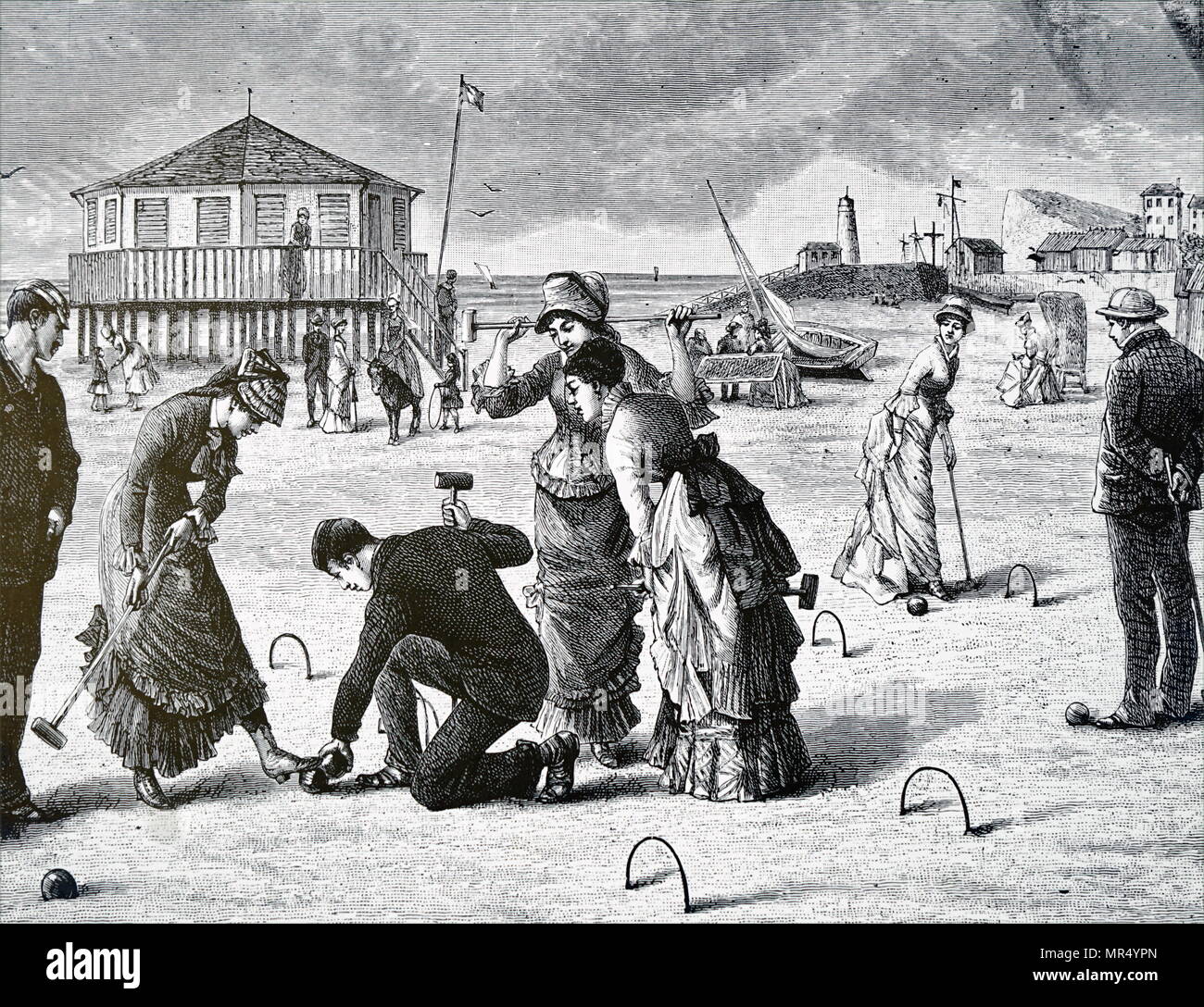 Ilustración mostrando un juego de croquet que se juega en la playa. Fecha del siglo XIX Foto de stock