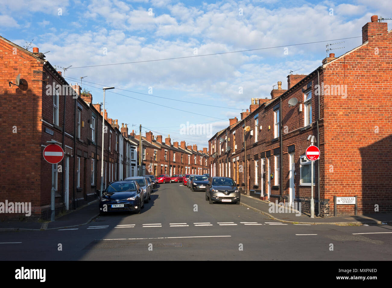 Casas adosadas, calle, ciudad del norte de la comunidad.St Helens, Lancashire, Merseyside, Inglaterra, Gran Bretaña, Reino Unido, Foto de stock
