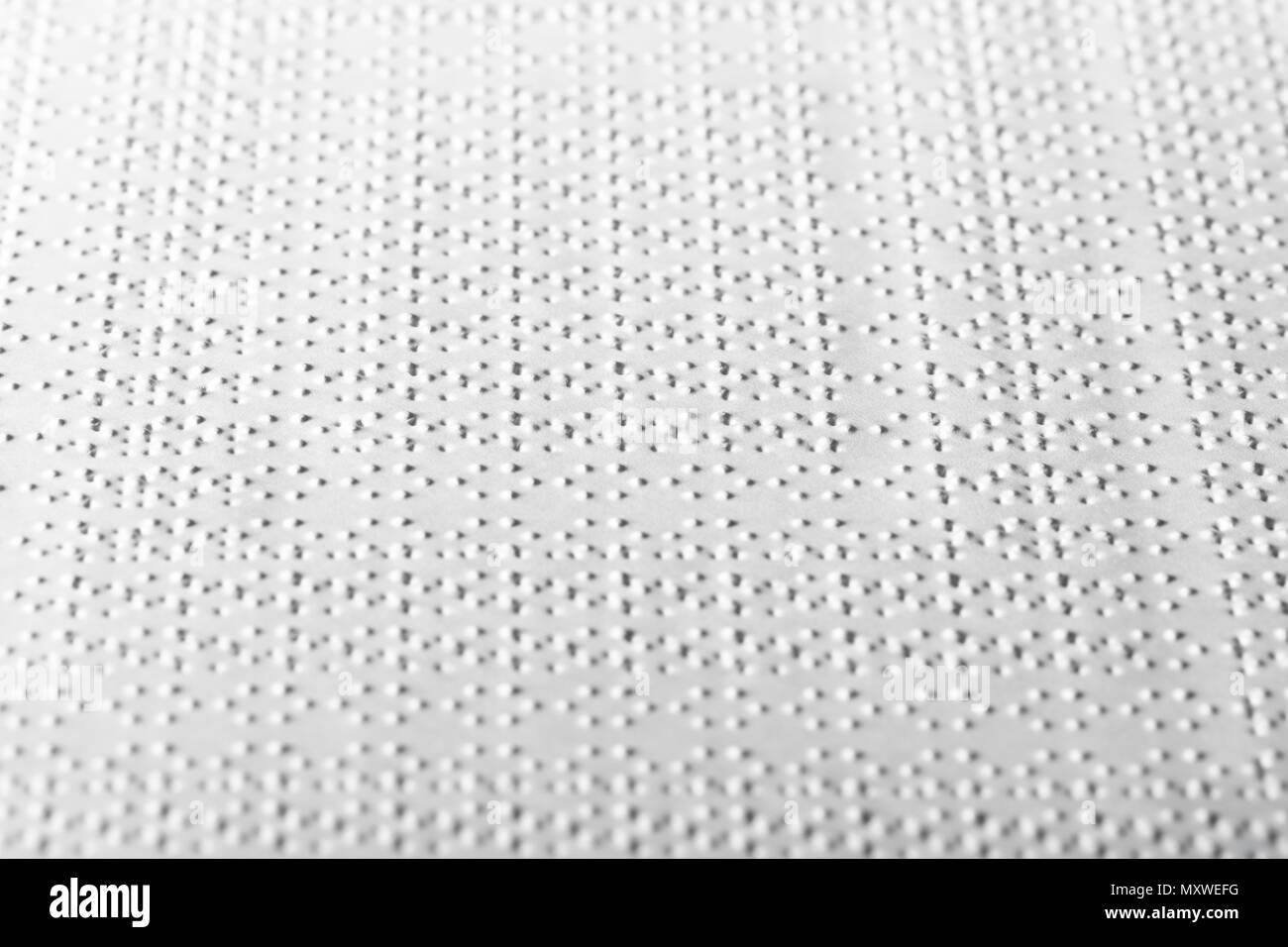Formación de un libro con texto en Braille. Patrón táctil. Foto de stock