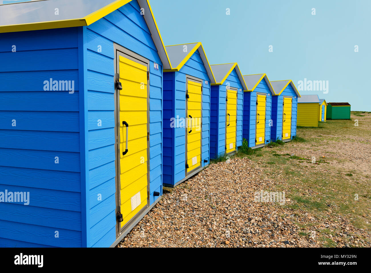 Pintadas cabañas de playa< Littlehampton West Sussex Foto de stock