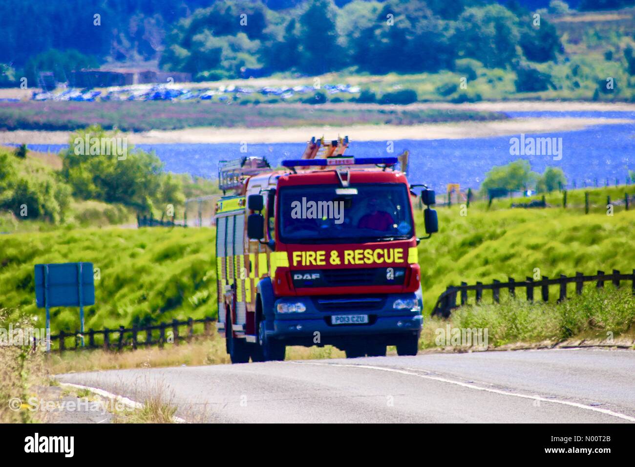 Winter Hill, Reino Unido. El 03 de julio de 2018. Los bomberos finalmente obtener un descanso de combate de incendios de pasto en invierno Hill Credit: maverick1251/StockimoNews/Alamy Live News Foto de stock
