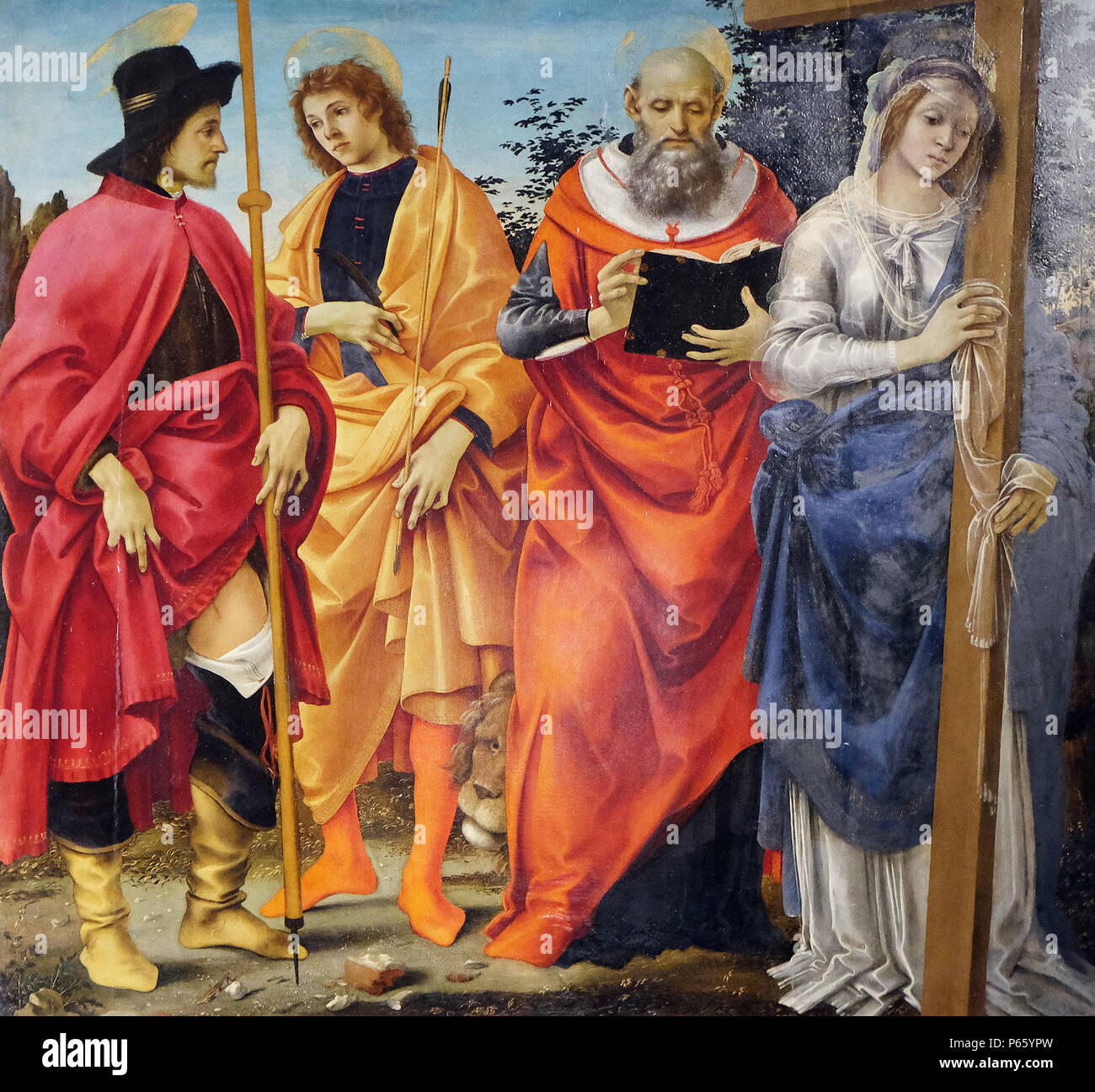 Pala Magrini por Filippino Lippi representando los santos Roch, Sebastián y Helena, San Jerónimo, San Michele in Foro iglesia en Lucca, Italia Foto de stock