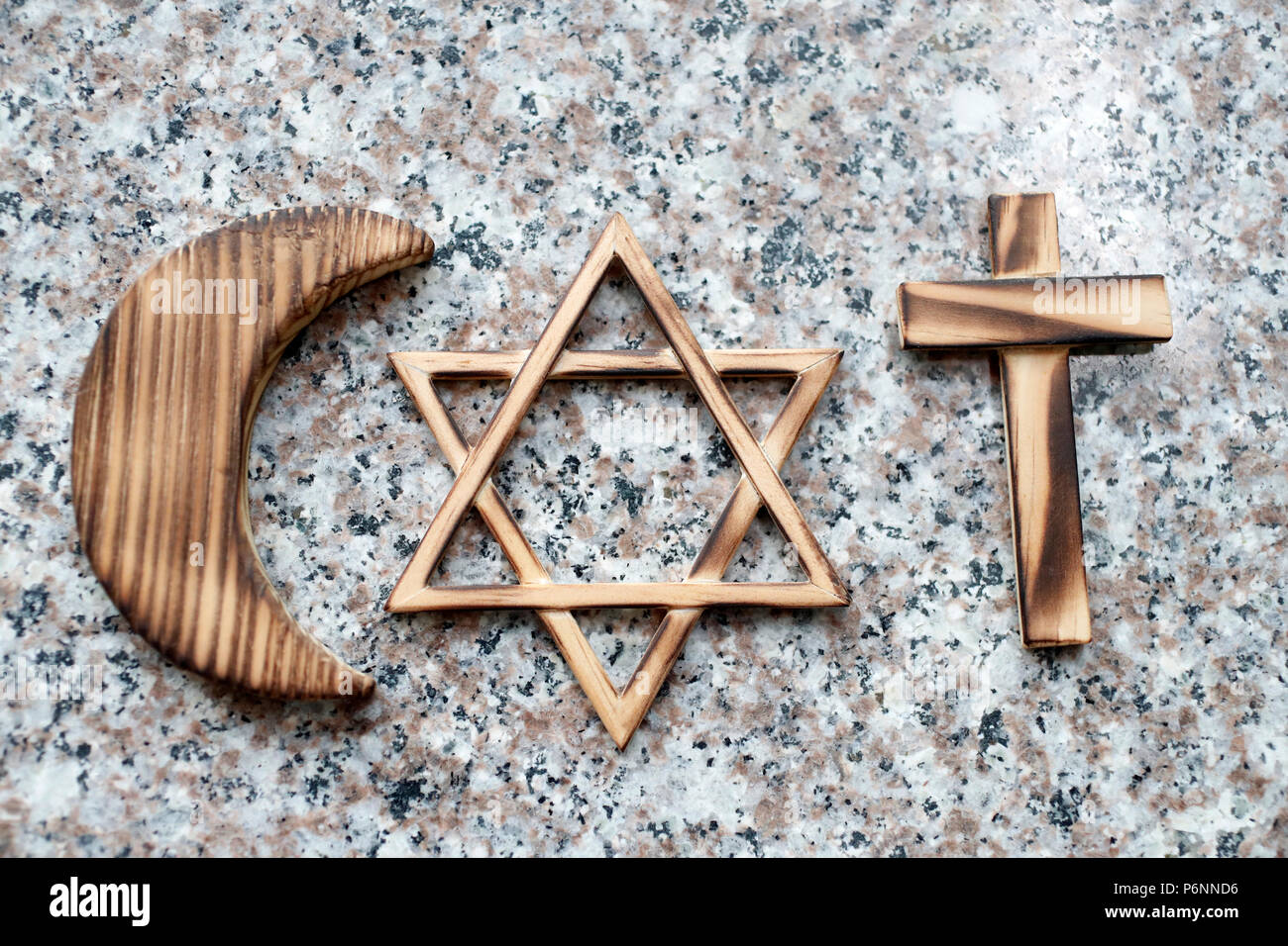 El cristianismo, el Islam, el Judaísmo 3 religiones monoteístas. La estrella judía, la Cruz y la