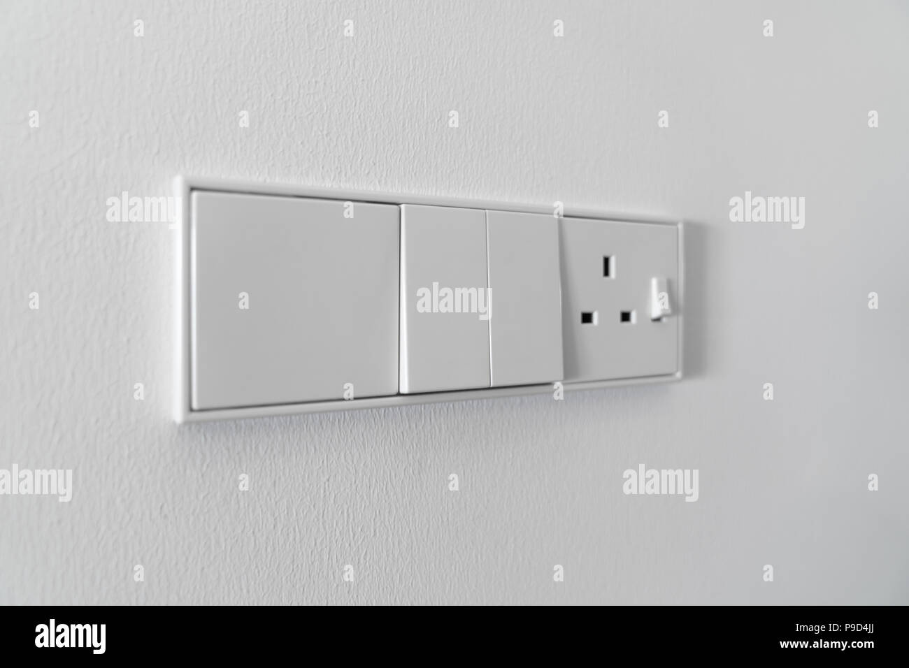 Interruptor De La Luz Moderno En La Pared Blanca Imagen de archivo - Imagen  de sitio, primer: 61984417