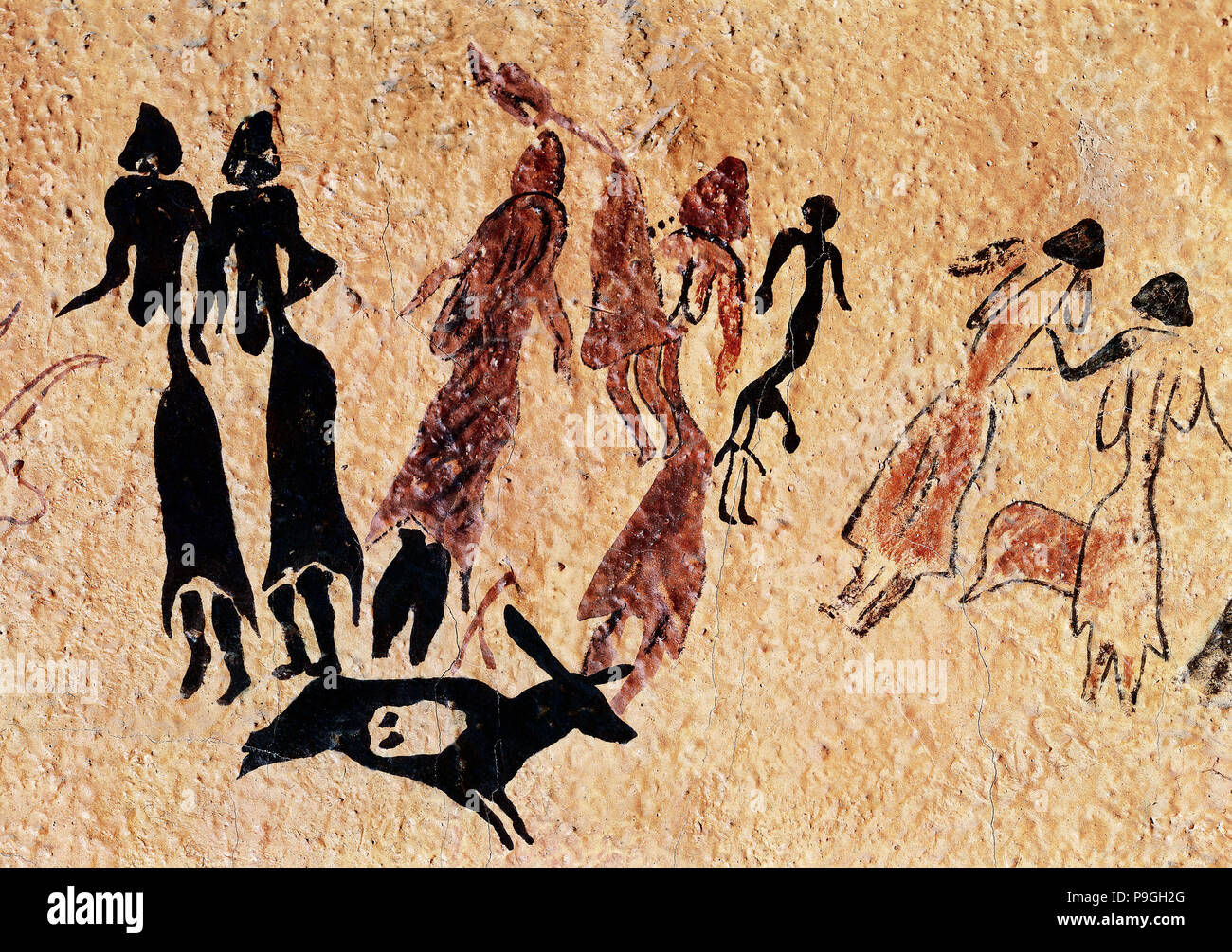 Pinturas rupestres típico del arte levantino, que se encuentra en la Roca dels Moros o la cueva de Cogull (Lleida)... Foto de stock