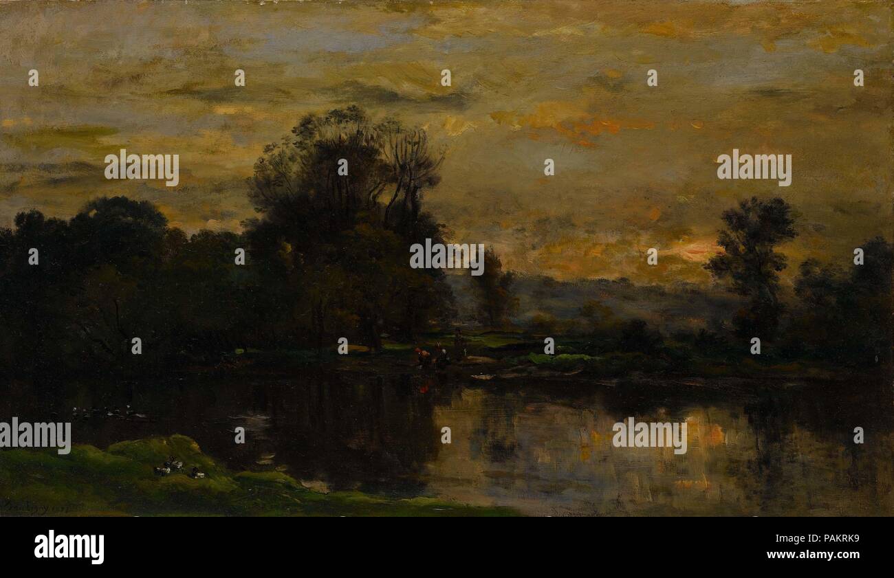 Paisaje con patos. Artista: Charles-François Daubigny (francés, París París, 1817-1878). Dimensiones: 15 x 26 1/2 pulg. (38,1 x 67,3 cm). Fecha: 1872. En este paisaje, Daubigny proporciona una tranquila vista de un río al atardecer en la Francia rural. El dramático halo naranja del cielo que domina la esquina superior derecha de la composición es equilibrada por el follaje de los árboles más oscuro a la izquierda. En el centro del lienzo, pequeño pero vibrante motas de pintura definir la ropa usada por las mujeres que lavan su ropa en el río. El agua, aún y reflectante, muestra una variedad de pinceladas ra Foto de stock