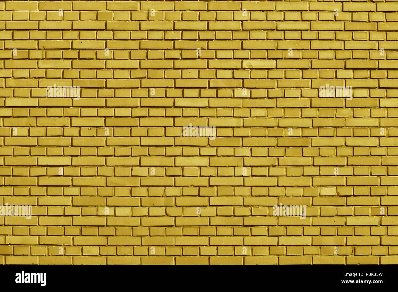 Ceilán color amarillo fondo de pared de ladrillo Foto de stock