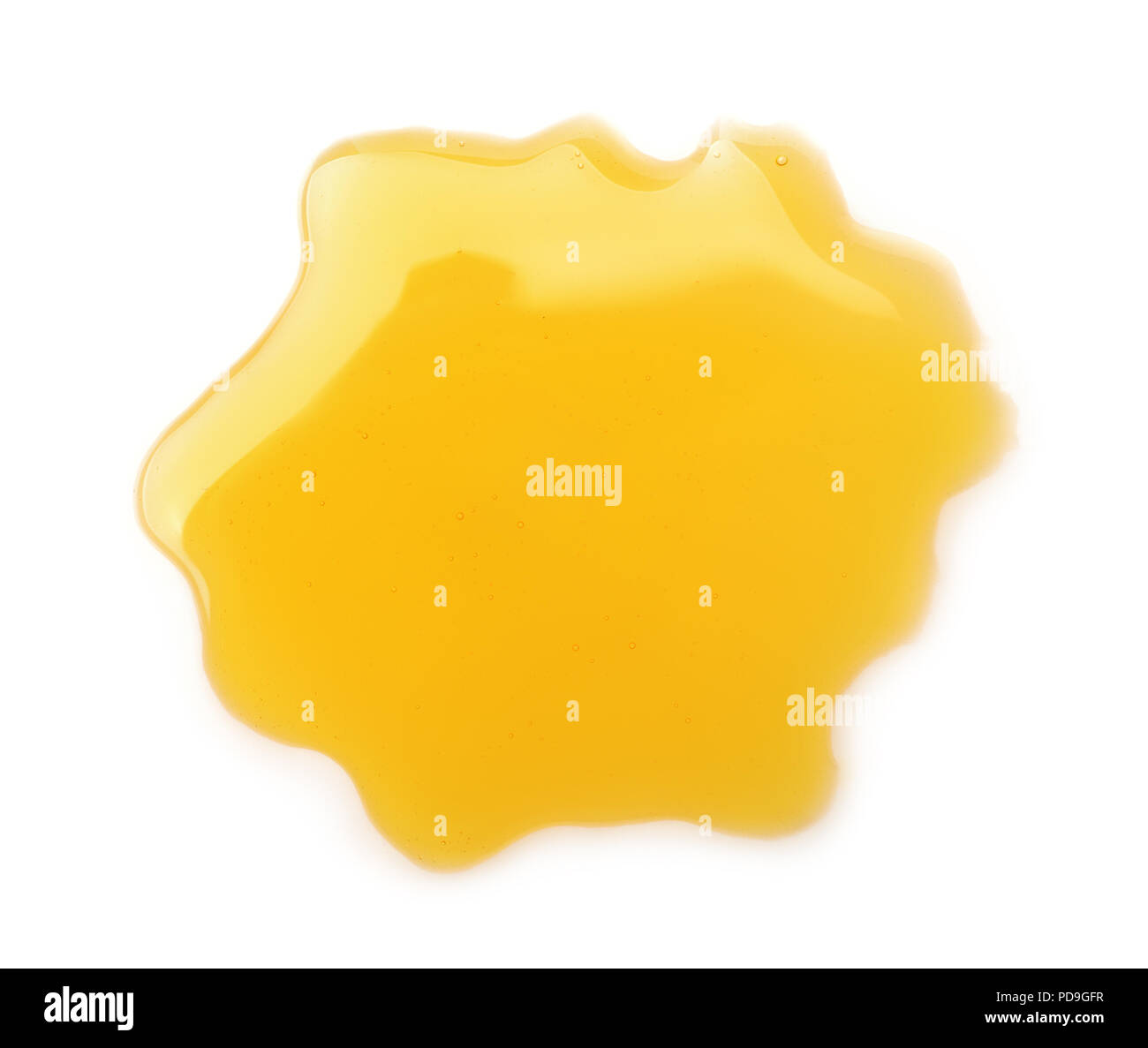 Vista superior de la miel charco aislado en blanco Foto de stock