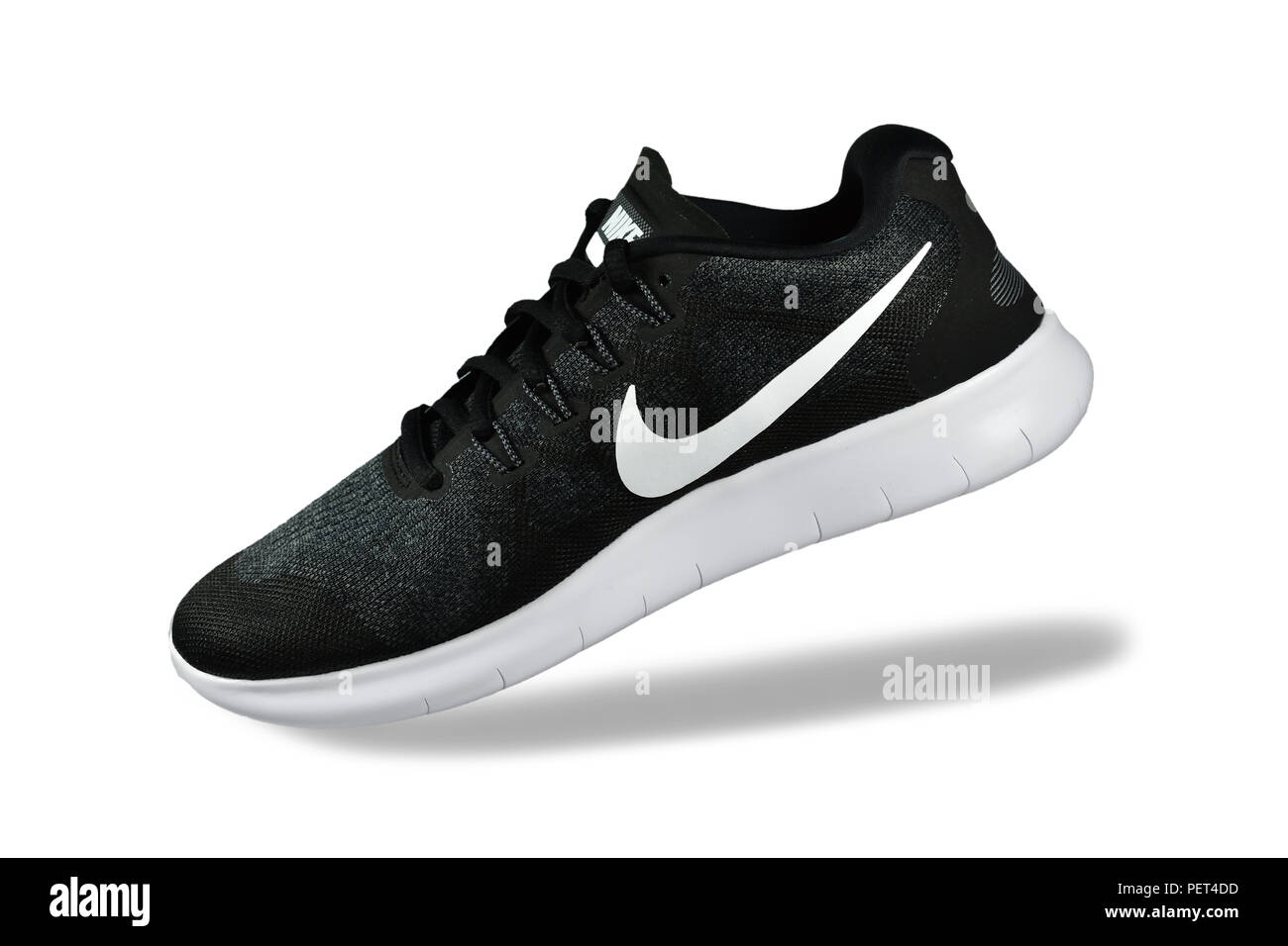 Nike running shoes fotografías e imágenes de alta resolución - Alamy