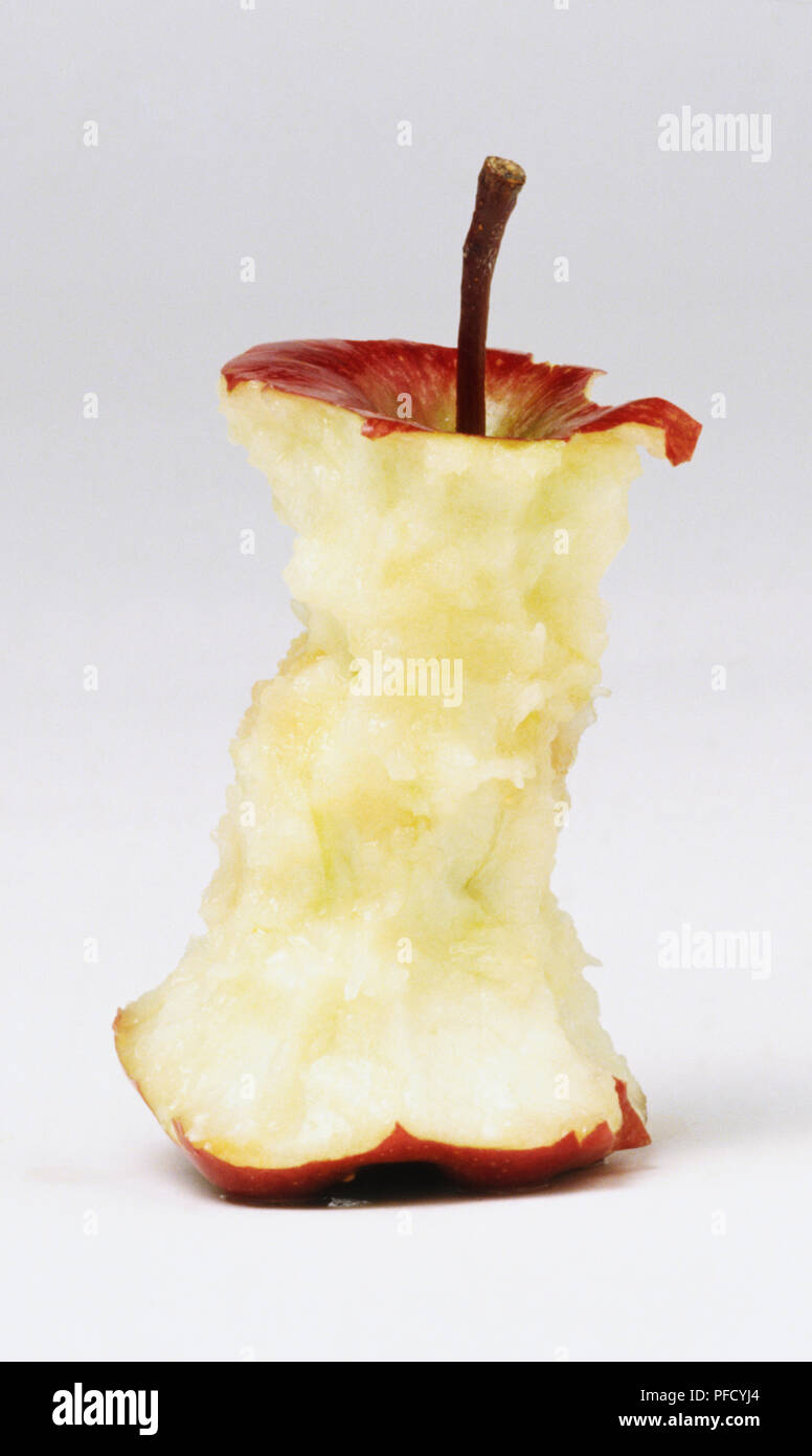 Apple core, comido restos de una manzana. Foto de stock