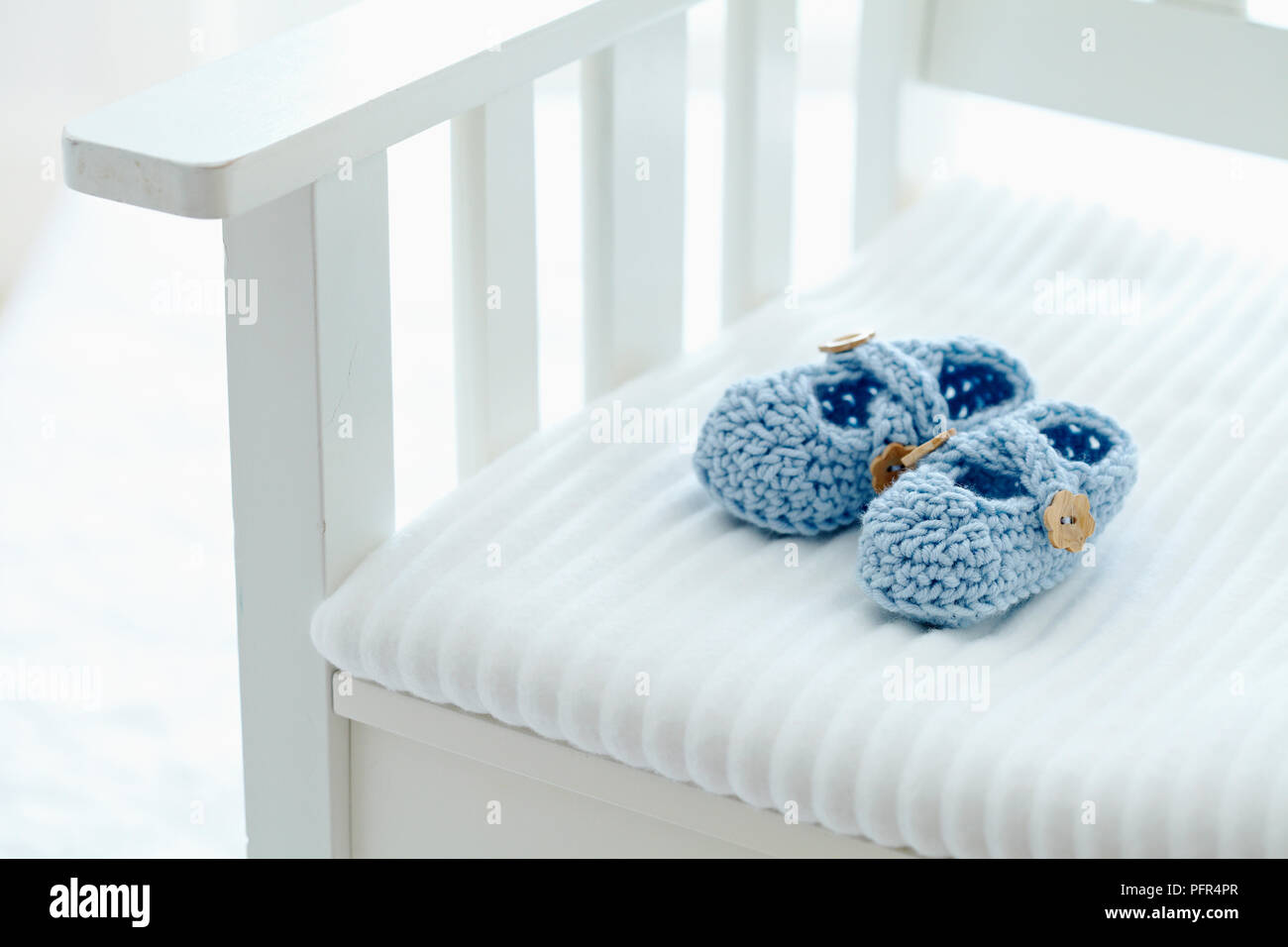 Del bebé crochet botines de cojín de asiento Foto de stock