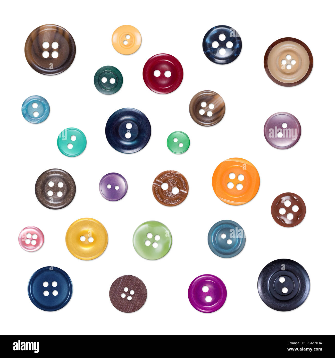 Conjunto de diversos colores de coser botones plásticos, aislado sobre fondo blanco con matices. Parte1 Foto de stock