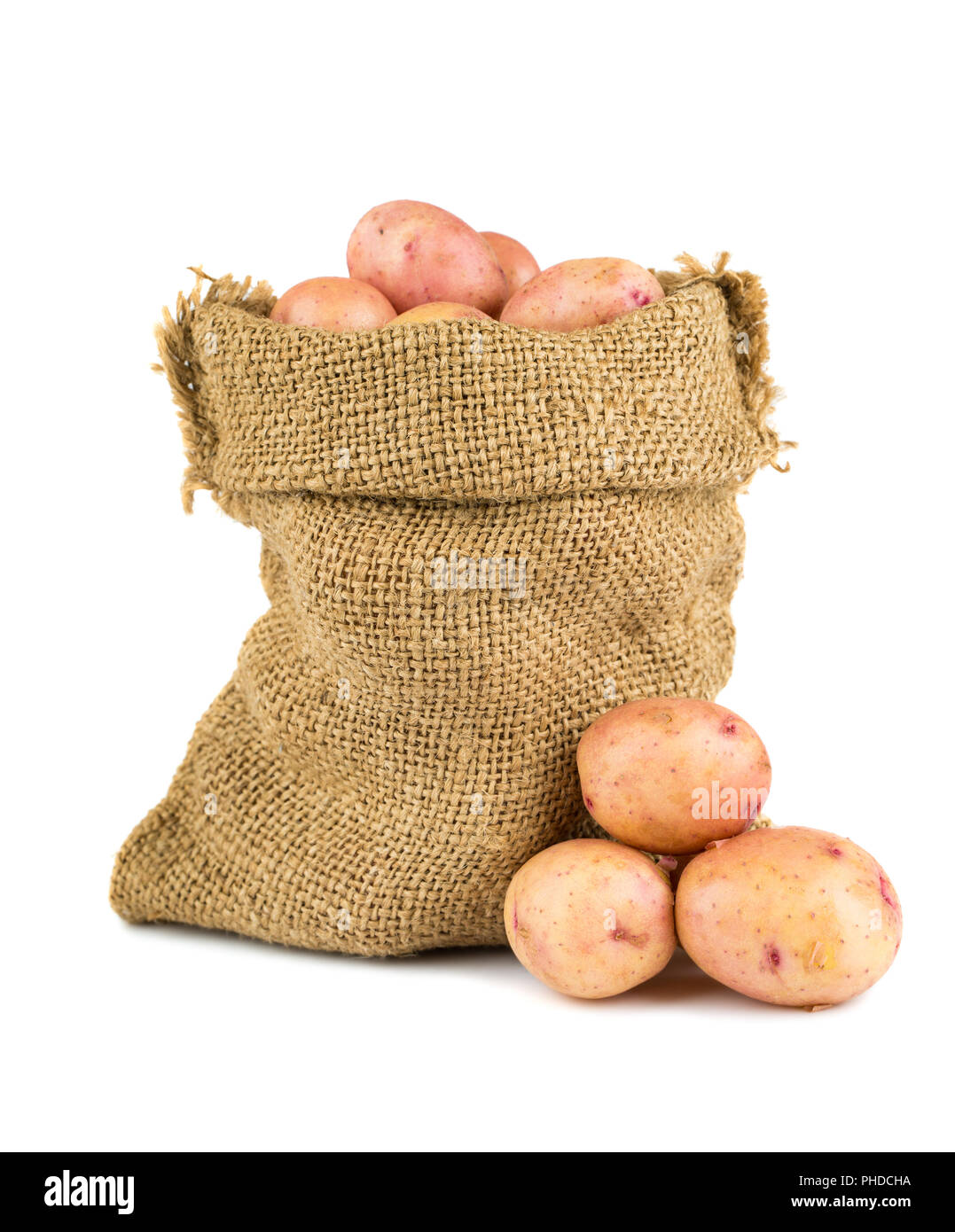 Patatas maduras en saco de henequen Foto de stock