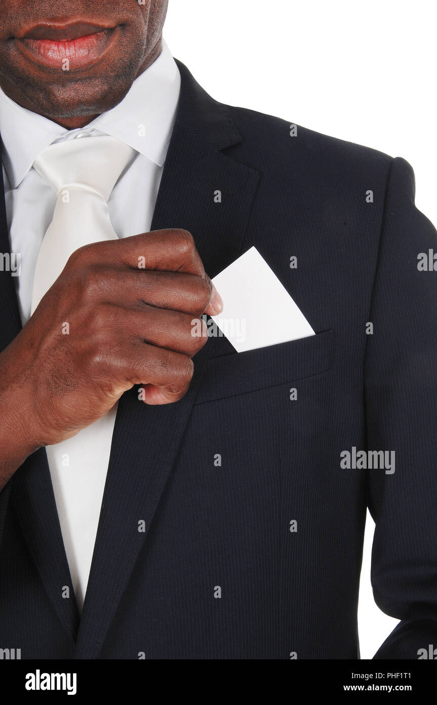 Hombre Negro poniendo business card en el bolsillo Foto de stock