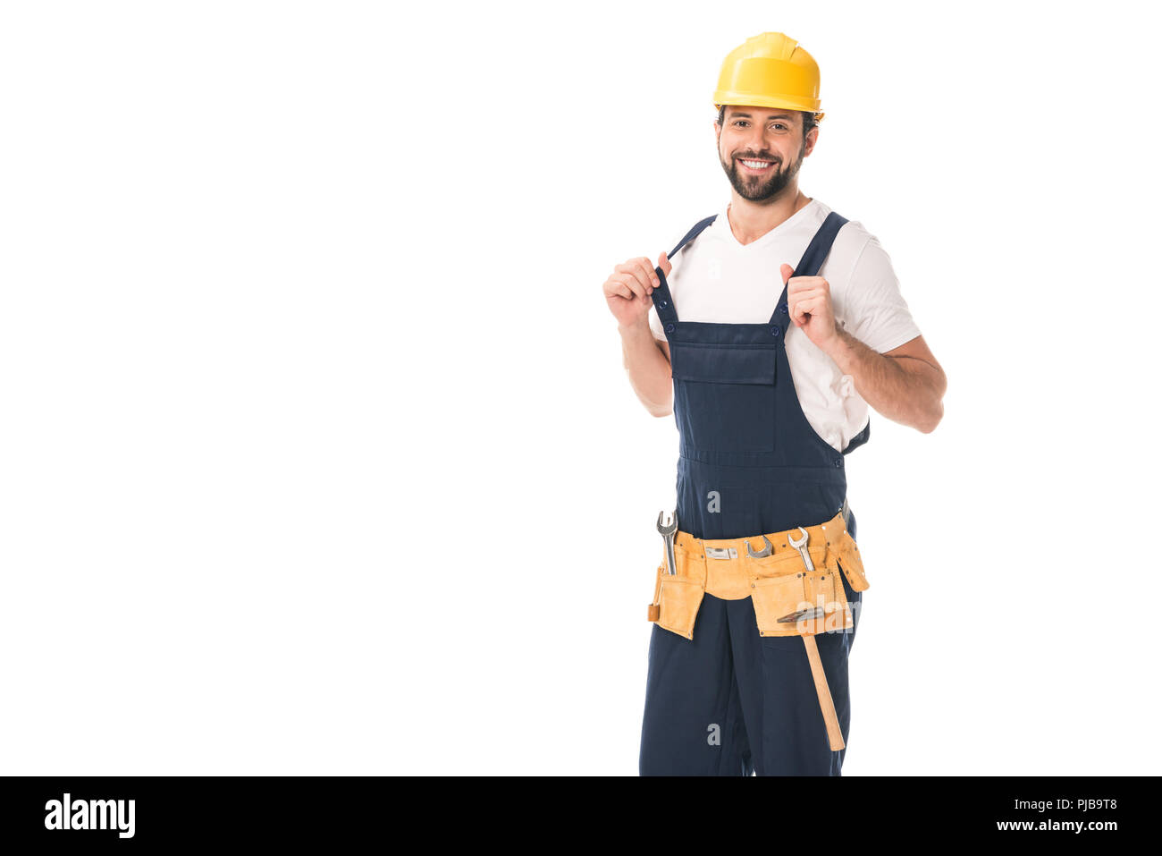 Trabajador feliz, retrato sonrisa guapo trabajo con cinturón de  herramientas de traje de seguridad y hombre de servicio de radio en  fábrica.