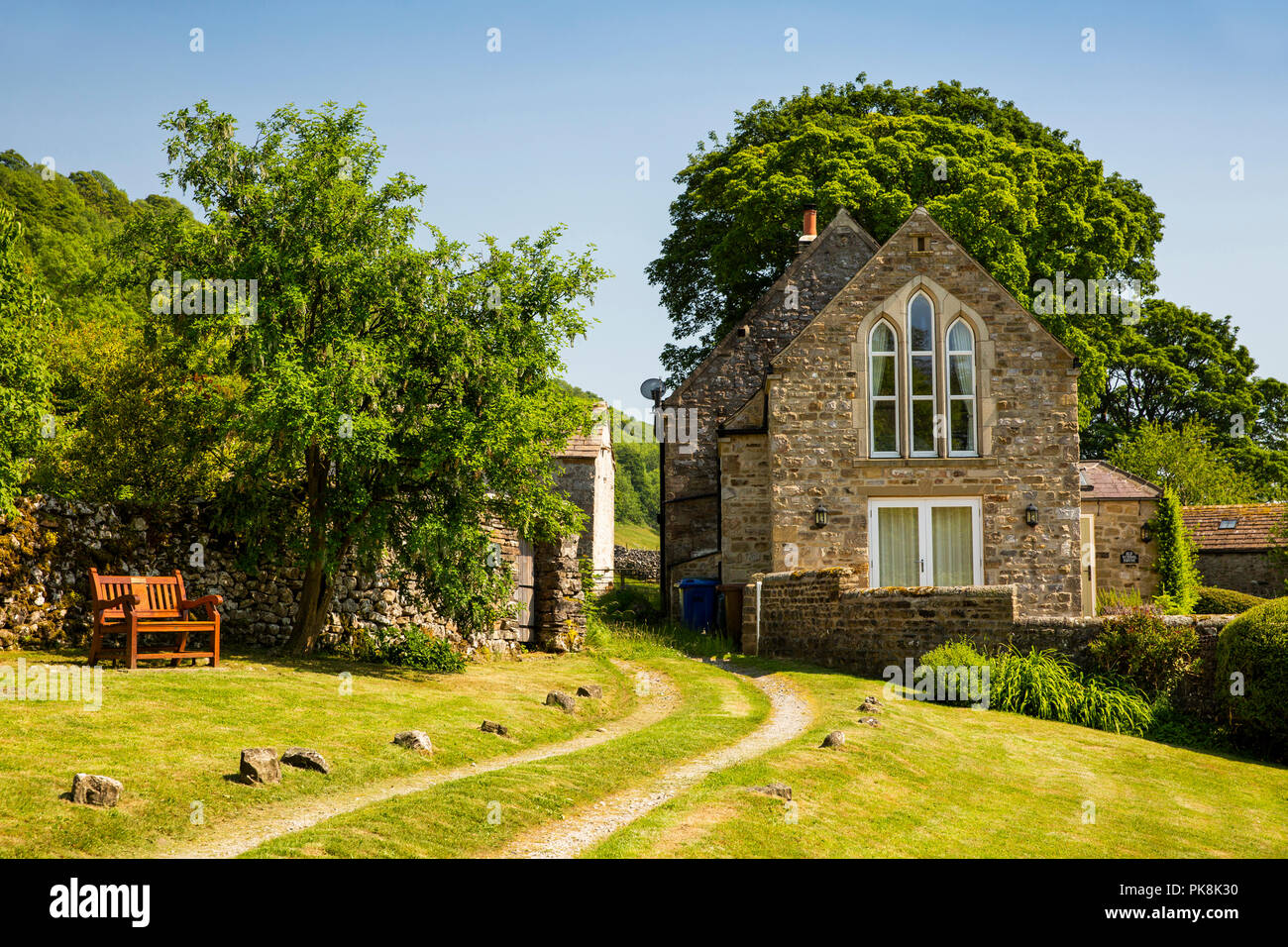 Reino Unido, Yorkshire, Wharfedale, Starbotton, La Casa de la vieja escuela, atractiva casa de piedra Foto de stock