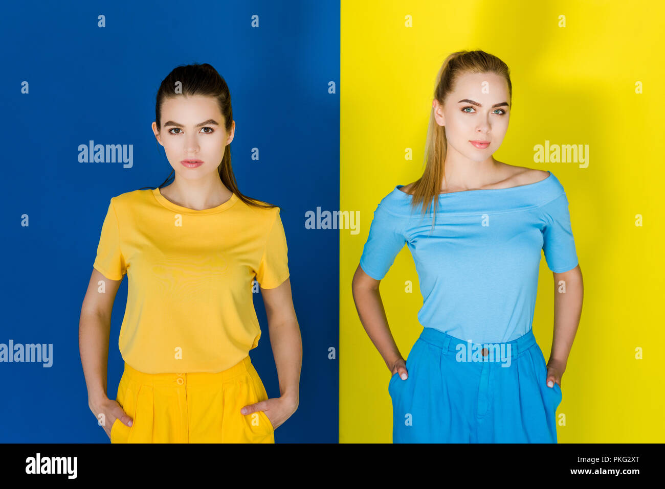 Chicas guapas en ropa de verano sobre fondo amarillo y azul Fotografía de  stock - Alamy