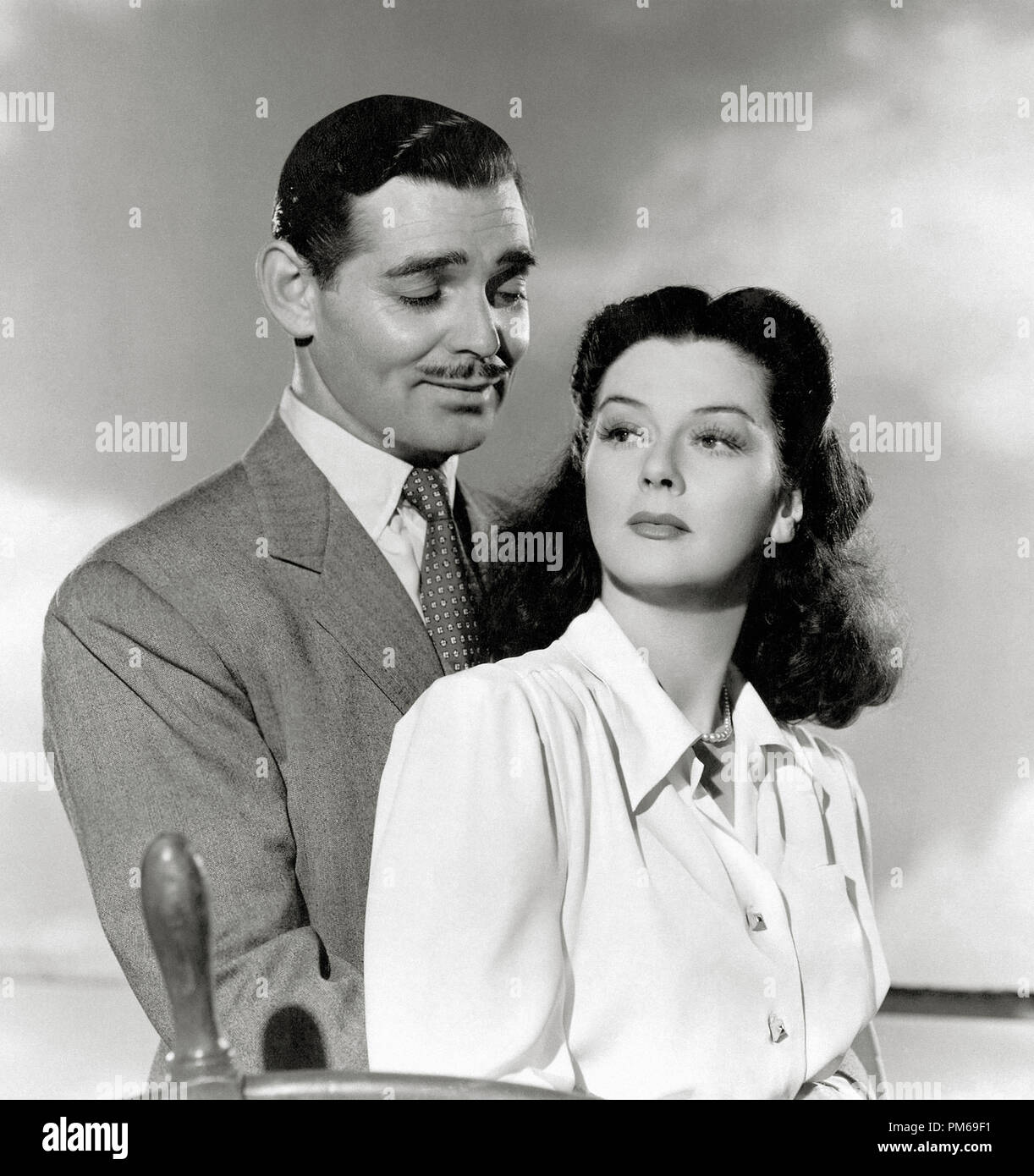 Rosalind Russell y Clark Gable, "se reunieron en Bombay' 1941 MGM Referencia de archivo # 31316 288tha Foto de stock