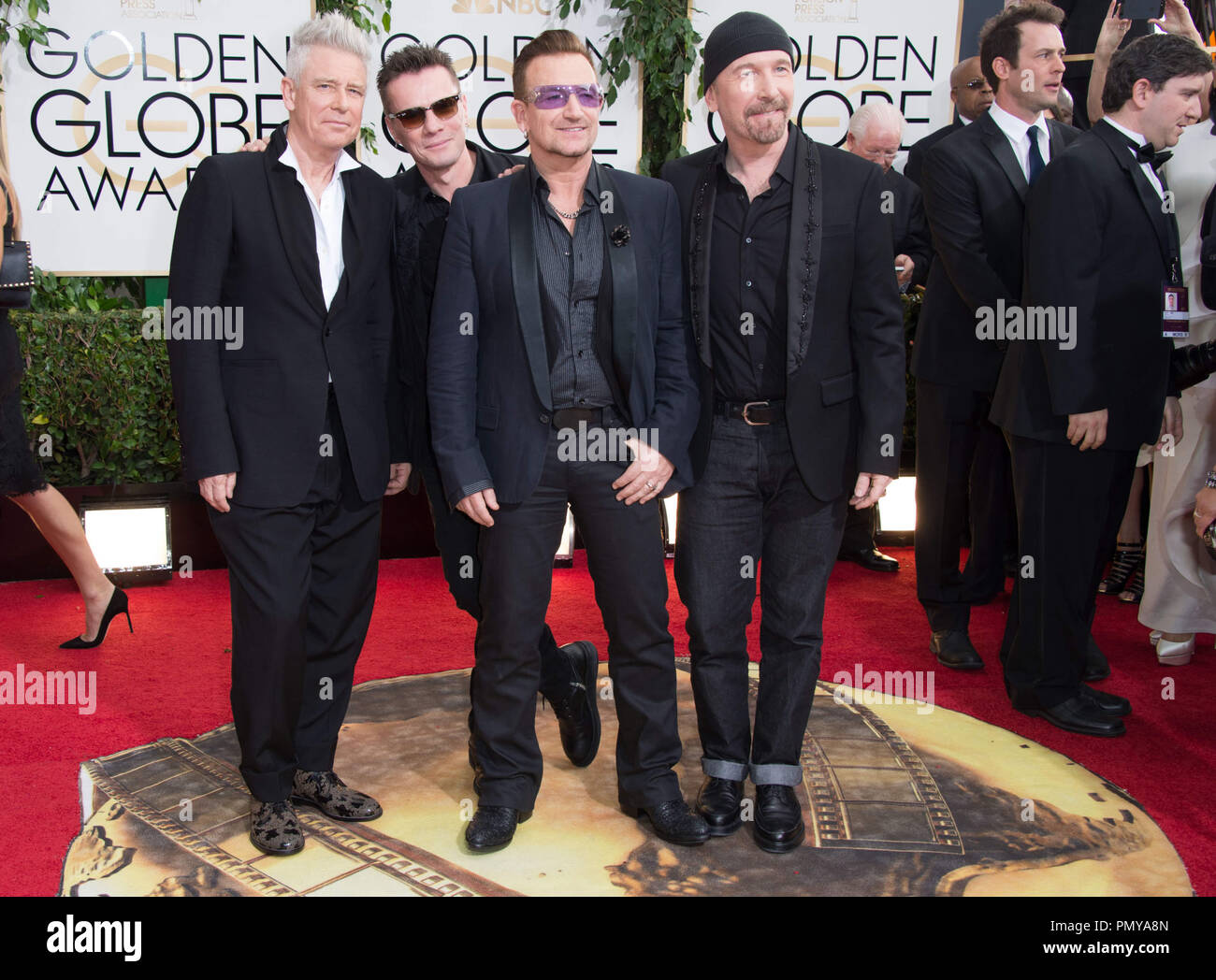 Nominada a mejor canción original - Motion Picture para "amor común" de Mandela: Caminata a la libertad - Bono, Edge, Adam Clayton, Larry Mullen, Jr. y Brian Burton asistir a la 71ª Anual de los Golden Globe Awards en el Beverly Hilton de Beverly Hills, CA el domingo, 12 de enero de 2014. Archivo de referencia # 32222 091CCI sólo para uso editorial - Todos los derechos reservados Foto de stock