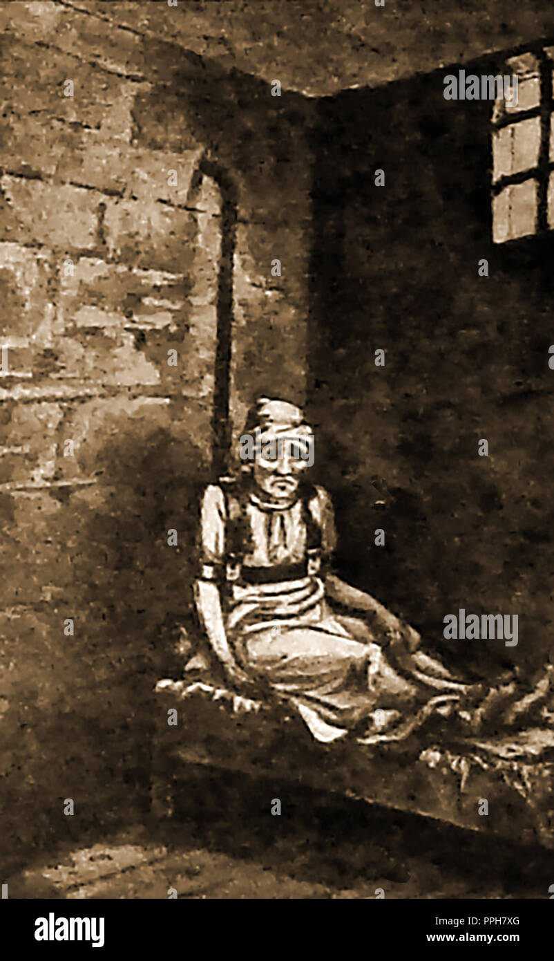 Un repaso recluso en una institución mental británica temprana (asilo lunático) en la época victoriana Foto de stock