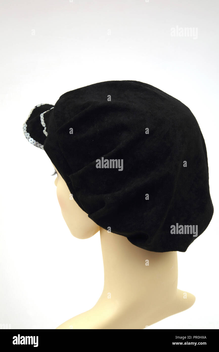 Mano Sombrero de terciopelo negro con lentejuelas Vista posterior Foto de stock