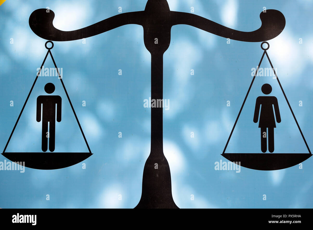 Las figuras masculinas y femeninas en la escala. La igualdad de género. Vung Tau. Vietnam. Foto de stock