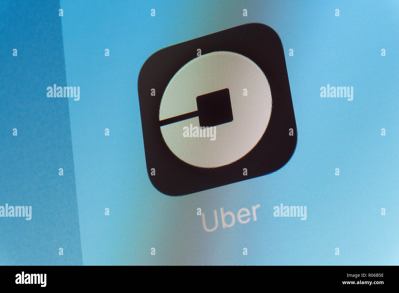 Uber App en la pantalla de teléfono móvil Foto de stock