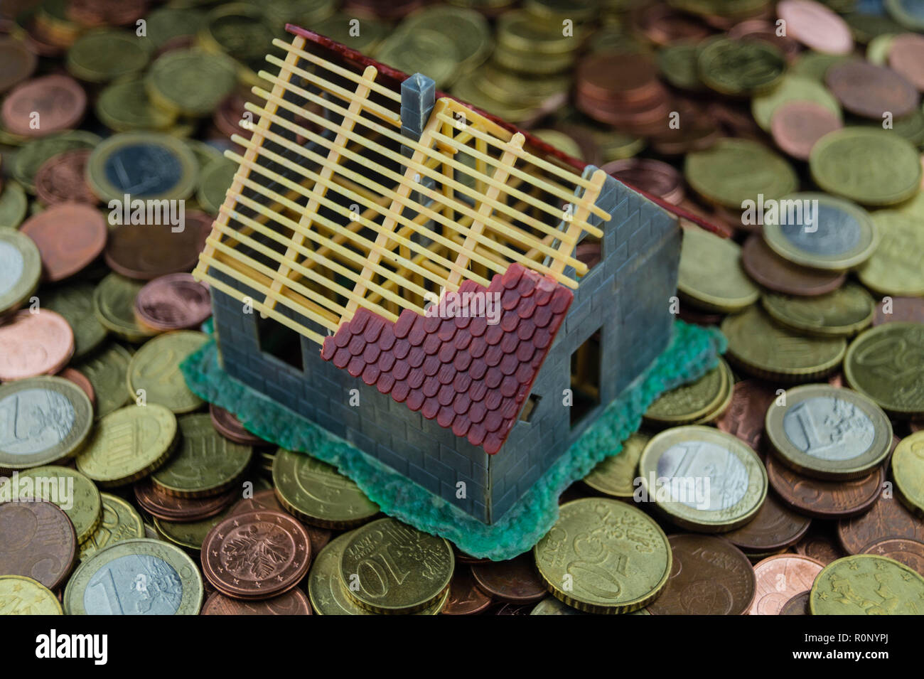 La prestación por hijo a construir y financiar una casa Foto de stock