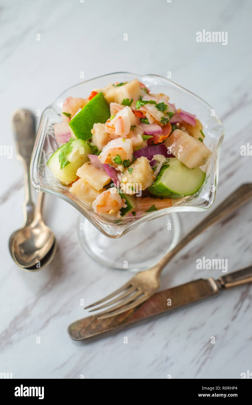 Pescado tilapia marinado fotografías e imágenes de alta resolución Alamy