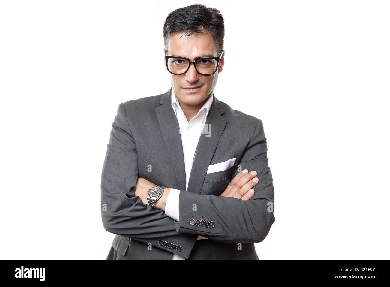 Retrato de un hombre de negocios sonriendo aislado sobre fondo blanco. Foto de estudio. Foto de stock