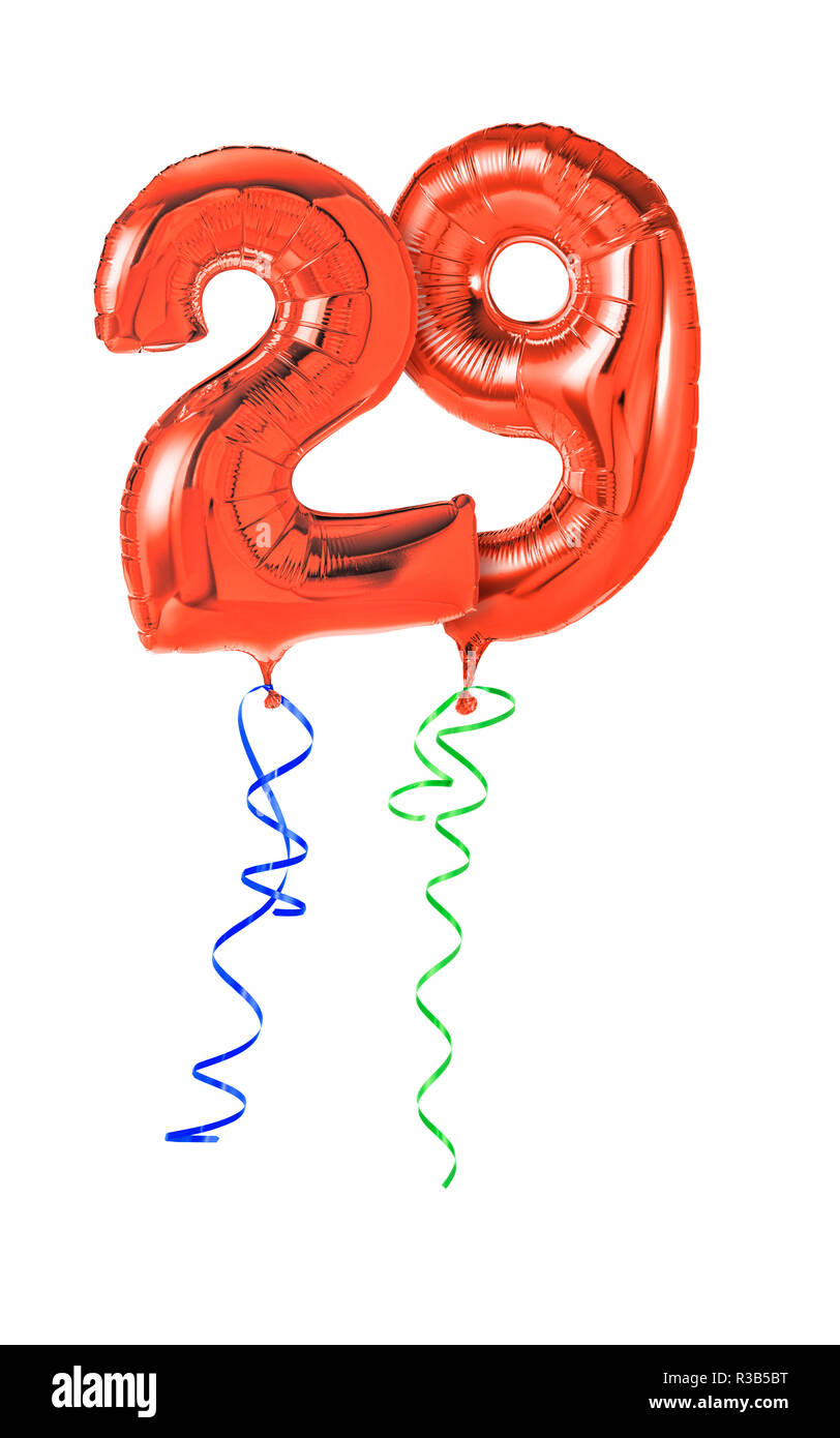 3 años con globo dorado. la celebración del aniversario. los globos con  confeti brillante salen volando de la caja, el número 3 en el fondo de la  habitación. el cumpleaños de una