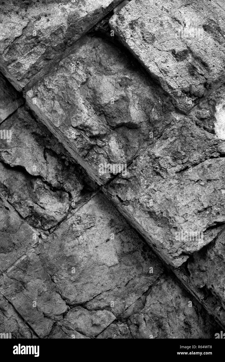 Detalle de la pared de piedra en blanco y negro Foto de stock