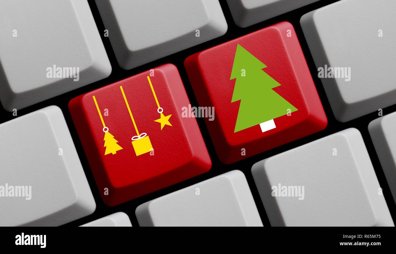 Teclado de color rojo con decoración de navidad y abeto Fotografía de stock  - Alamy