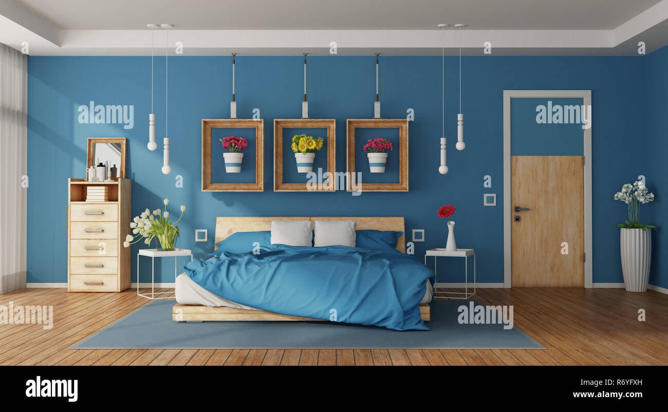 Moderno dormitorio principal azul Foto de stock