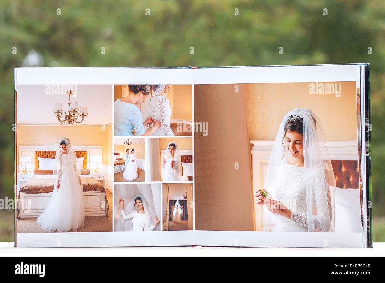 Las páginas del álbum de fotos de boda o un álbum de bodas sobre fondo  verde Fotografía de stock - Alamy