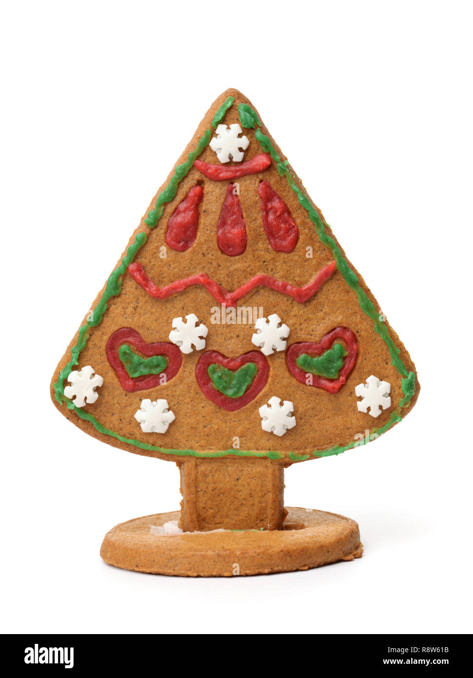 Cookie de árbol de pan de jengibre de Navidad aislado en blanco Foto de stock