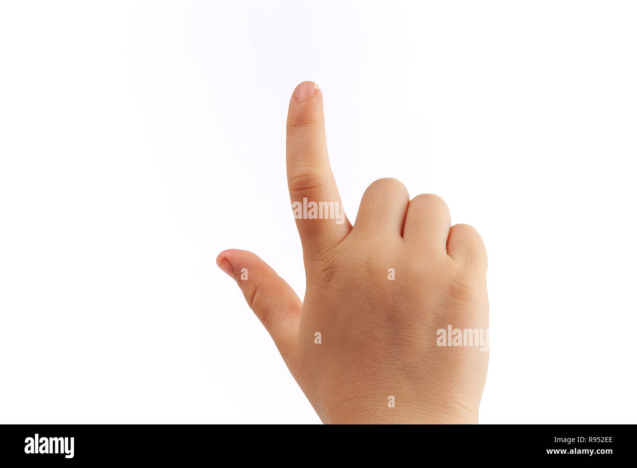 Derecho del niño golpeando suavemente con el dedo índice aislado sobre fondo blanco. Foto de stock