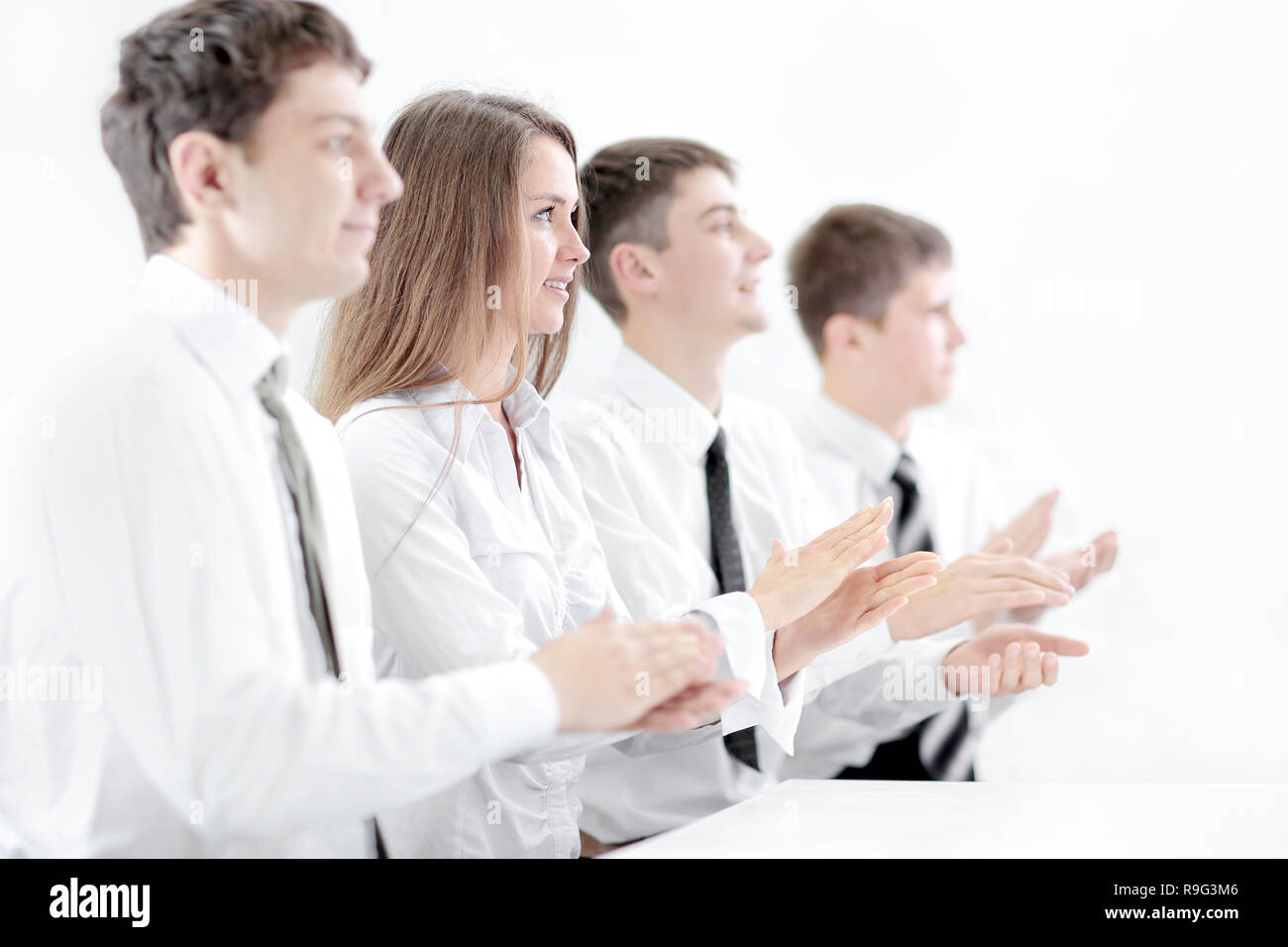 Imagen de un equipo comercial aplaudiendo en el signo de aprobación Foto de stock