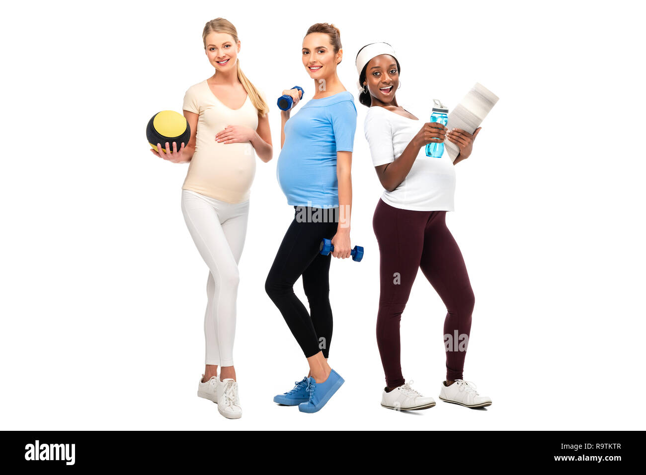 grupo de la misma mujer embarazada haciendo ejercicio con una pelota fondo  blanco Fotografía de stock - Alamy