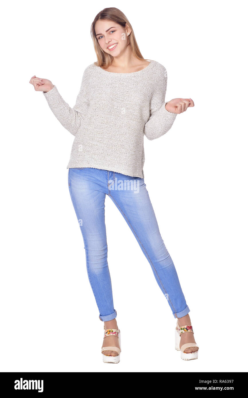 Retrato de mujer hermosa en blue jeans posando aislar Foto de stock