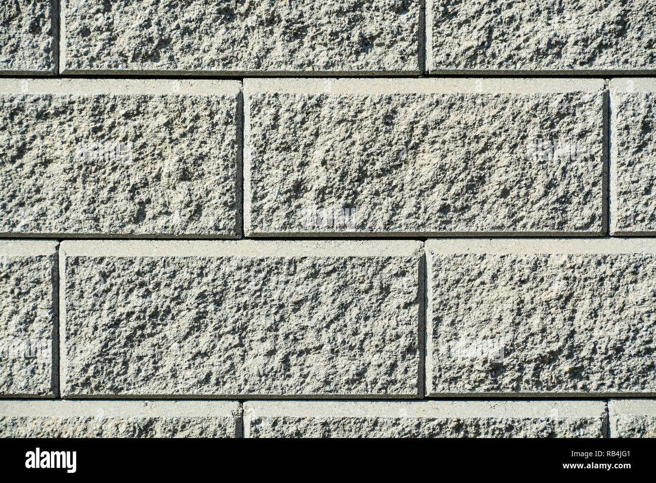 Muro de Piedra de textura de hormigón. Fondo de pared de bloques de cemento  Fotografía de stock - Alamy