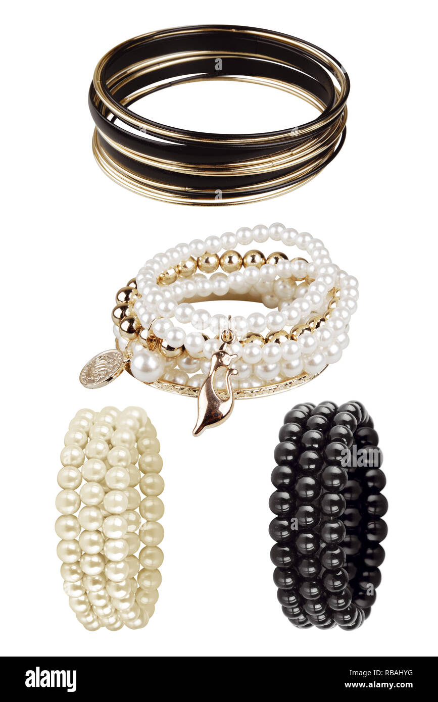 Mujer elegante pulseras de redondas. Accesorios de lujo aislado sobre fondo blanco, trazados de recorte incluido Fotografía de - Alamy