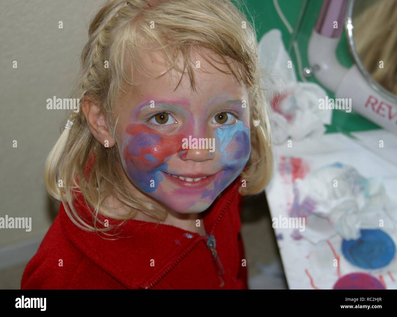 Naughty Little Girl cara pintada Foto de stock