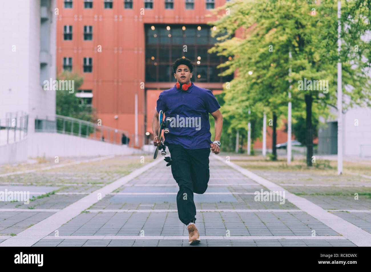Hombre corriendo, Milan, Italia. Foto de stock