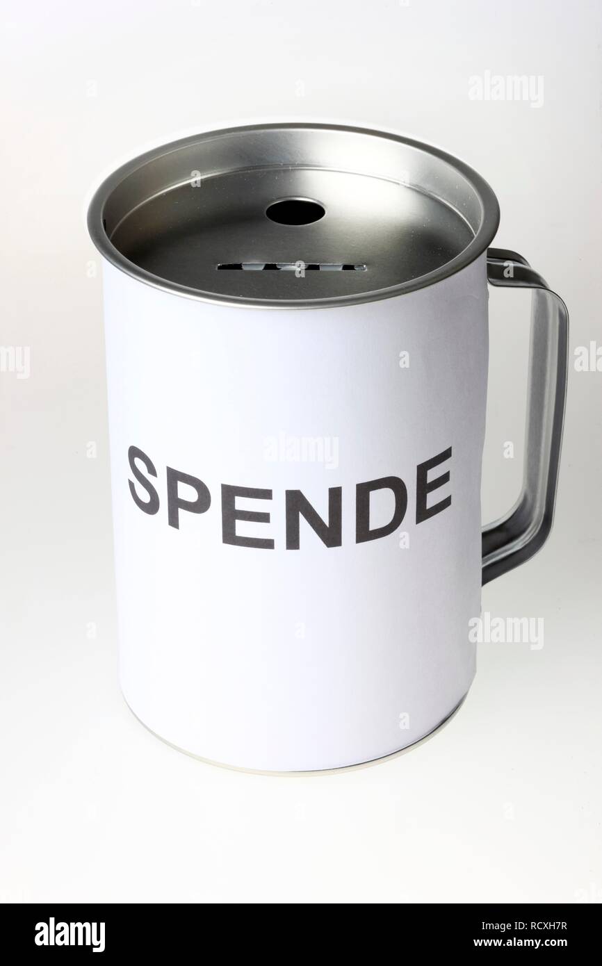 Caja de donación etiquetada Spende, Alemán para la donación, con ranuras para monedas y billetes Foto de stock
