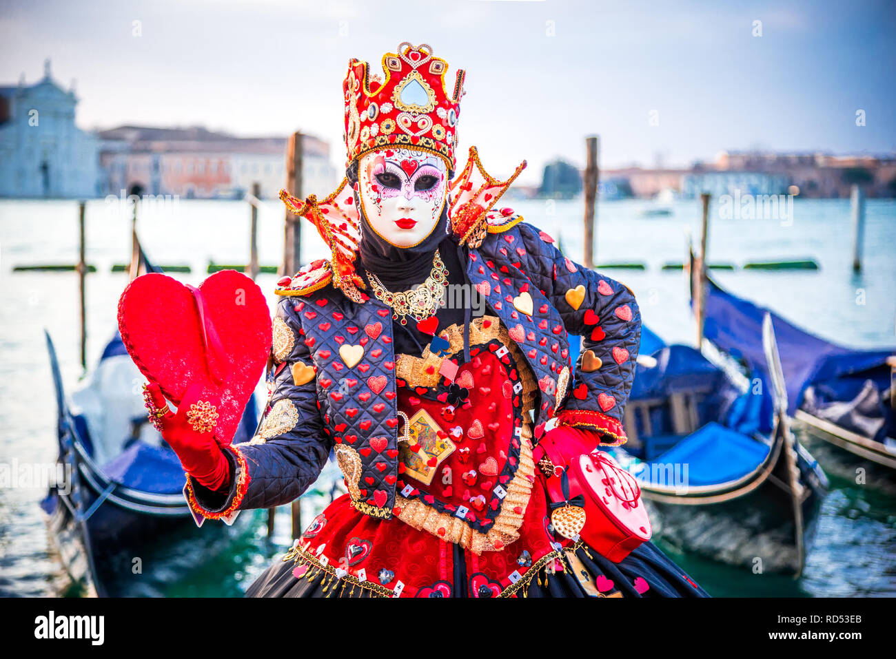 Venecia, el Carnaval de Venecia, con hermosa máscara en la Plaza de San Marcos y el Gran Canal, Italia Foto de stock