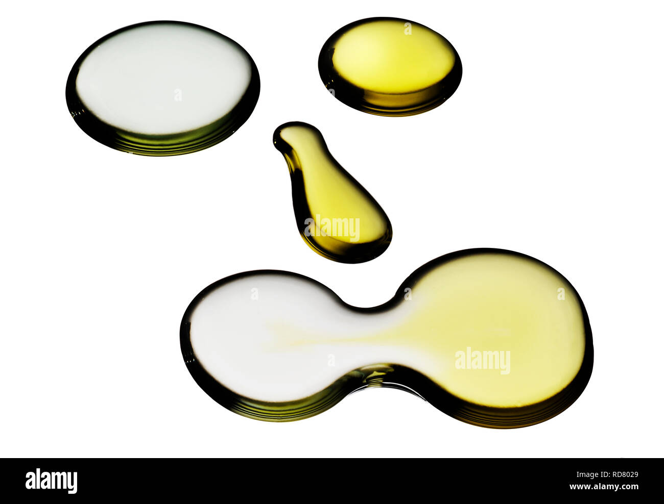 Los pedazos de vidrio en tonos de color amarillo sobre fondo blanco. Foto de stock