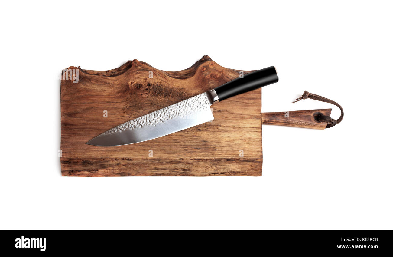 Cuchillo de cocina en madera antigua junta de corte Foto de stock